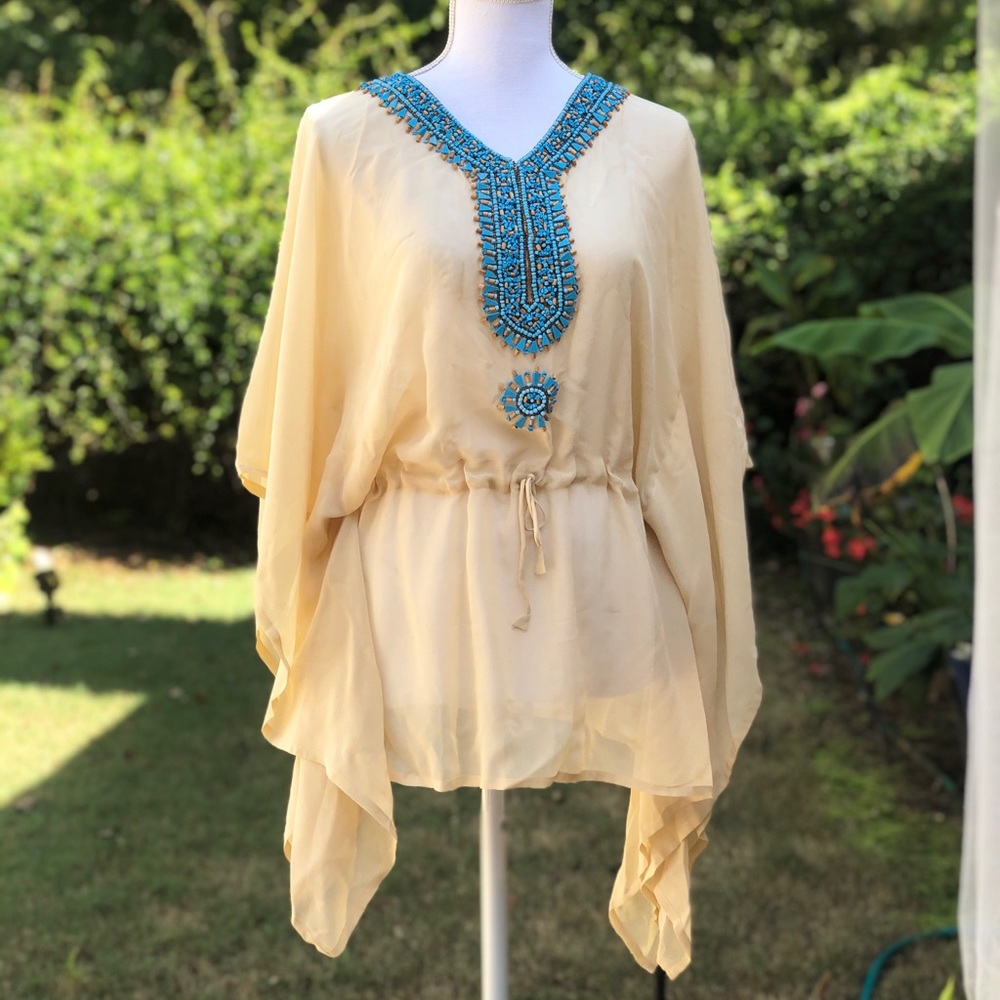 Kaftan boho top with turquoise beaded neckline.